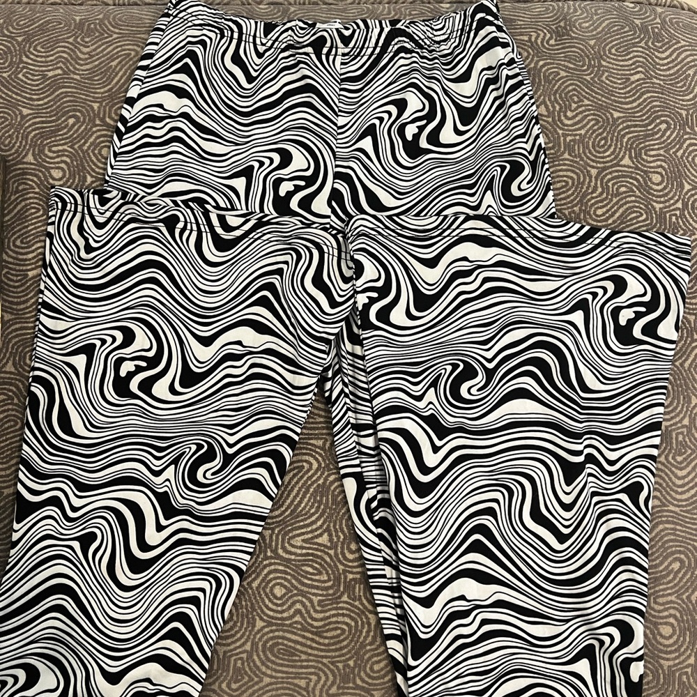 RSQ spandex flare zebra print pants in size S.